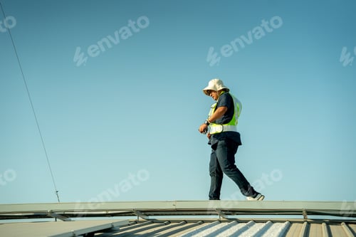 Preview: Engineer working setup Solar panel at the roof top. Engineer or worker work on solar panels or solar