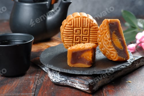 Preview: Mooncake, Moon cake-Round shaped Chinese traditional pastry with tea cups on white background, Mid-A