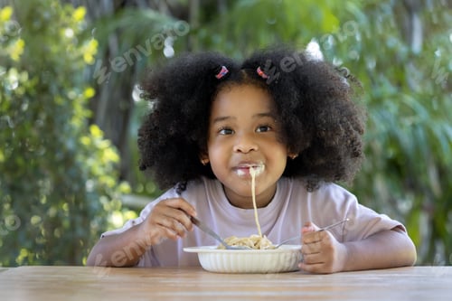 Preview: Child enjoyment with eating.
