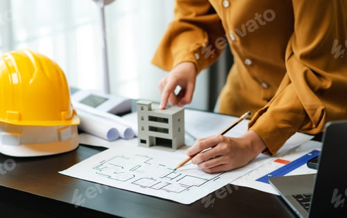 Preview: Architect designing with blueprints, compass, and safety helmet. Perfect for construction,