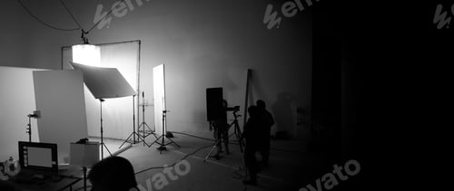 Preview: Shooting studio for photographer and creative art director with production crew team setting up ligh