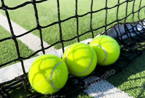 Preview: Tennis ball on grass tennis court