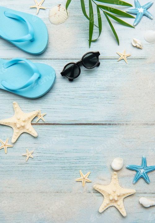 Preview: Summer beach essentials on wooden background