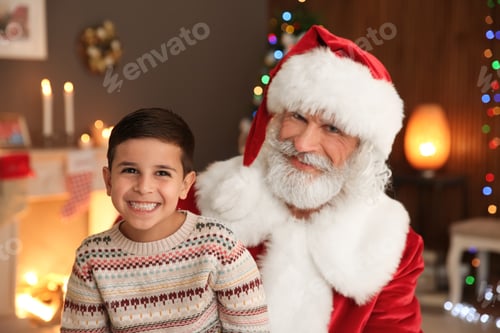Preview: Portrait of little child with Santa Claus at home. Christmas celebration