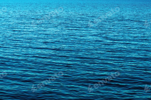 Preview: Rippled surface of blue sea water in morning