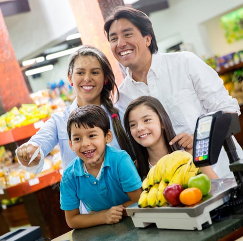 Preview: Happy Family Paying For Groceries At The Supermarket