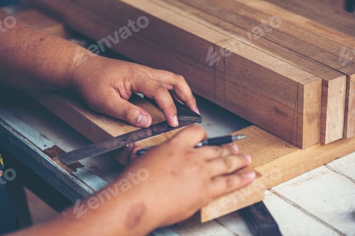 Preview: woodworking workshop of carpenters work table with different tools and wood cutting stand