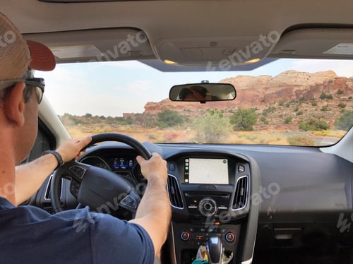 Preview: Man driving on a road trip