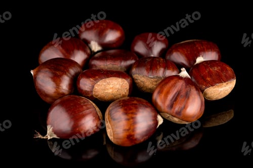 Preview: Chestnuts on a black reflective background