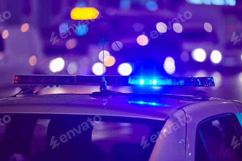 Preview: Police car lights at night city street