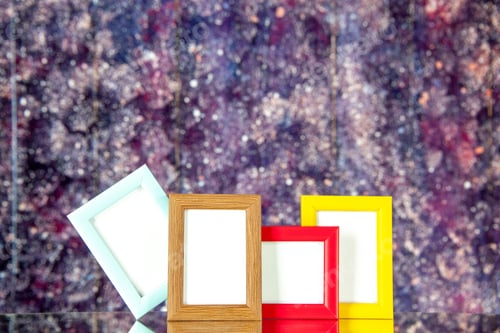 Preview: front view picture frames with colored corners on bright background portrait picture family photo