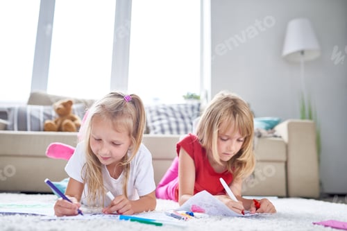 Preview: Pretty Little Girls Drawing on Floor