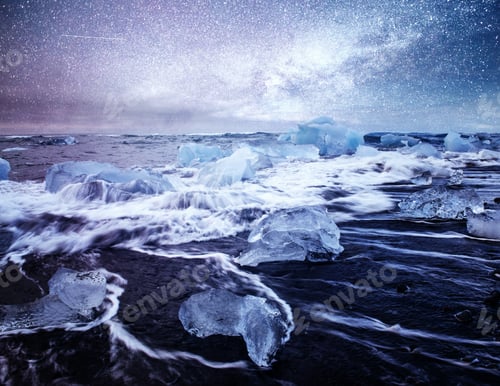 Preview: Icebergs floating in Jokulsarlon glacial lake. South Iceland. Lagoon. Starry sky night. Fantastic