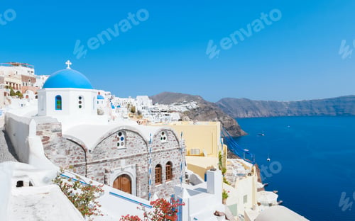 Preview: Oia Santorini Greece on a sunny day during summer with whitewashed homes and churches, Greek Island