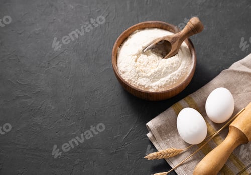 Preview: Organic ingredients for baking, wheat flour, eggs, rolling pin and kitchen textiles