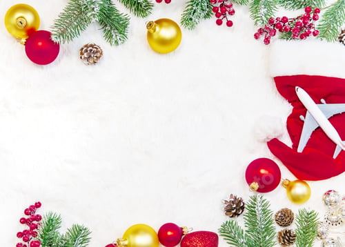 Preview: beautiful christmas background with airplane, travel concept. selective focus.