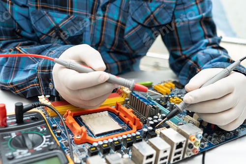 Preview: technician repairing inside of hard disk by soldering iron. Integrated Circuit. the concept of data