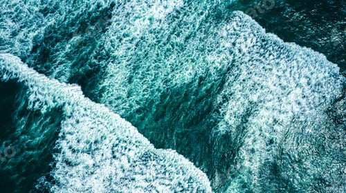 Preview: Drone view over ocean waves , on summer sunny day. Top view to the beautiful green Atlantic Ocean.