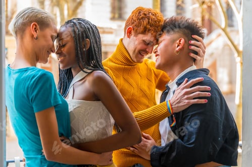 Preview: Diverse lesbian and gay couples enjoying a romantic moment together on a balcony