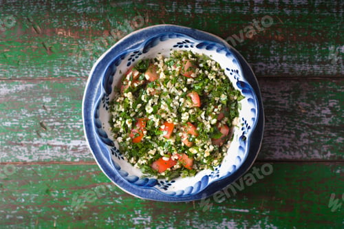 Preview: Tabouli salad on the old wooden background top view