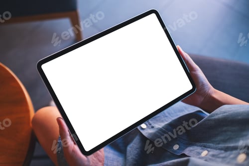 Preview: Mockup image of a woman holding digital tablet with blank white desktop screen in cafe