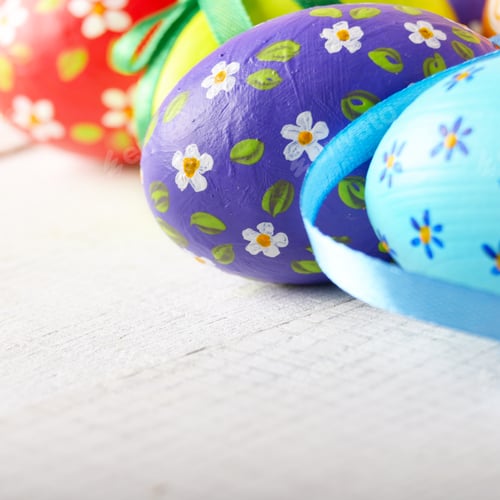 Preview: Painted decorated easter eggs on white table