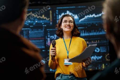 Preview: woman is giving a presentation at conference