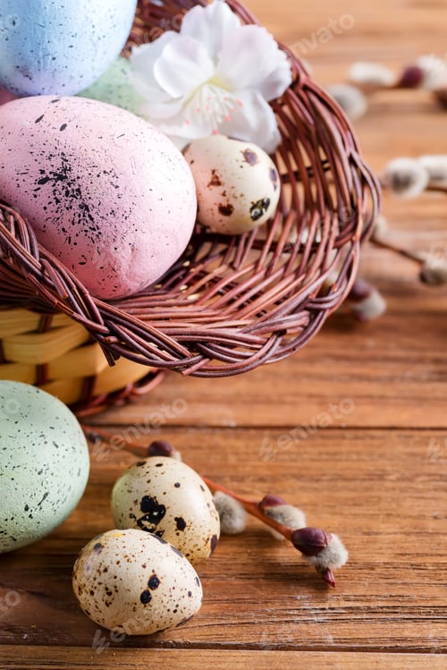 Preview: Congratulation Easter card from basket with handmade painted chicken and quail eggs on a wooden