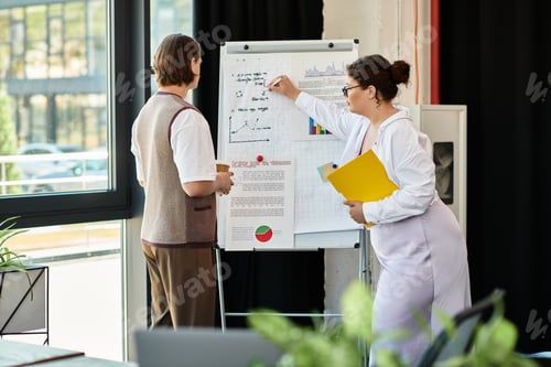 Preview: Young plus size woman discusses business strategy with her male friend in a modern office setting