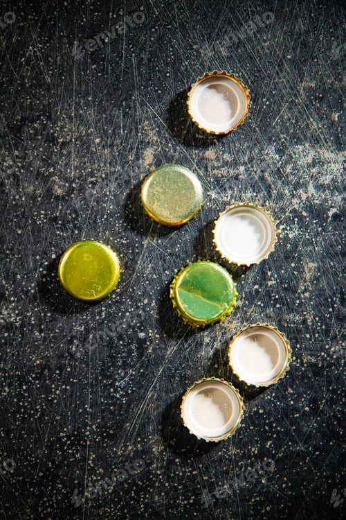 Preview: Several beer bottle caps.