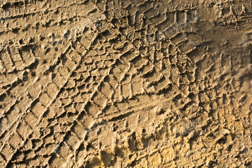 Preview: High angle shot of the tire tracks on the muddy ground