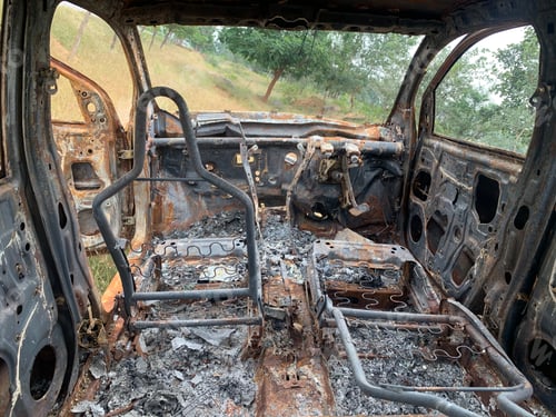 Preview: Closeup of the remains of an old crashed car burned from the inside