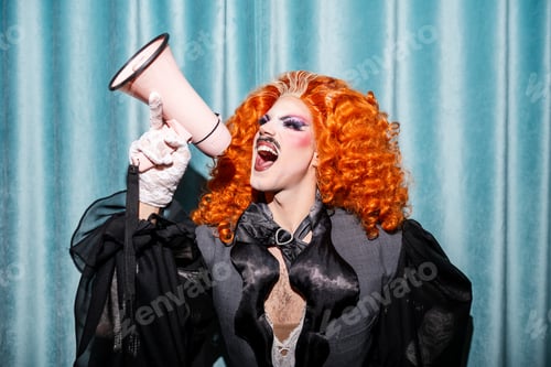 Preview: Queer Activist Passionately Shouting With a Megaphone at a Community Event