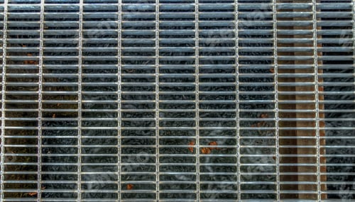 Preview: Hdr Image Of A Metal Grate Over Water.