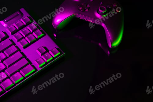 Preview: Computer keyboard and joystick on black background close up
