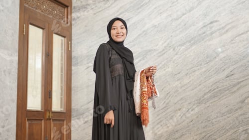 Preview: Muslim woman after worship at the mosque