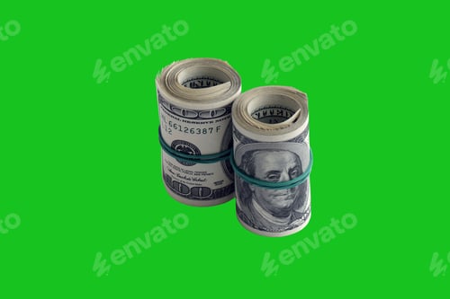 Preview: Bundle of US dollar bills isolated on chroma keyer green