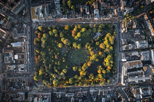 Preview: Aerial view of the Saint Stephens Green park during golden hour