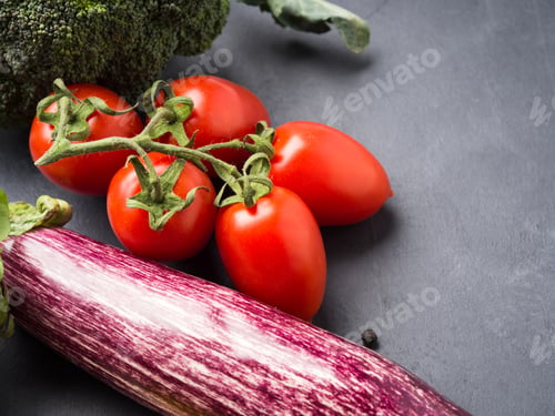 Preview: Mix of raw vegetables with salt, spices on dark