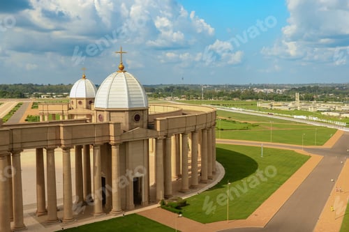 Preview: Basilica of Our Lady of Peace in Yamoussoukro Ivory Coast surrounded by serene landscape
