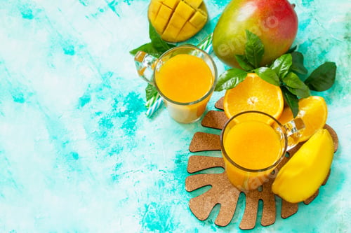 Preview: Fruit tropical smoothies in glass bottles with mango.