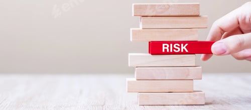 Preview: hand pulling block with RISK word on the tower. Management, Opportunity and strategy Concepts