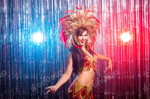 Preview: Holidays, party, dance and nightlife concept - Beautiful woman dressed for carnival night