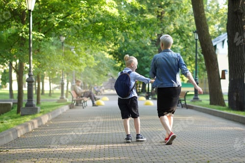 Preview: mother and son going to school holding hands