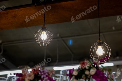 Preview: Electric lamps in wire shades. Fashionable