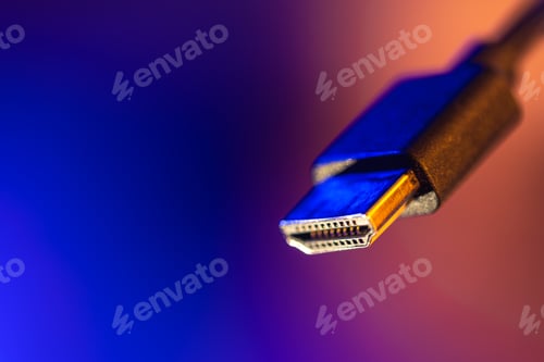 Preview: Hdmi plug in focus on blue copyspace. Neon connection.