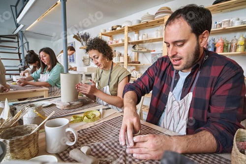 Preview: Potters at Work in a Ceramics Studio