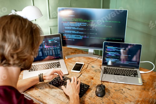 Preview: Programmer working with program code