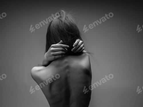 Preview: pretty woman posing naked back studio black and white photo