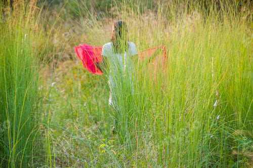 Preview: Beautiful young girl outdoor enjoying nature. young girl in meadow.